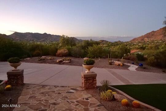 patio terrace at dusk with a mountain view