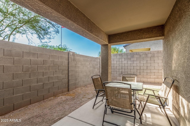 1940 W Expressman St, Apache Junction, AZ 85120 - fenced backyard with outdoor dining area and a patio area
