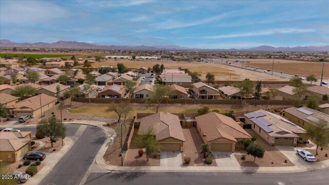 drone / aerial view with a residential view and a mountain view