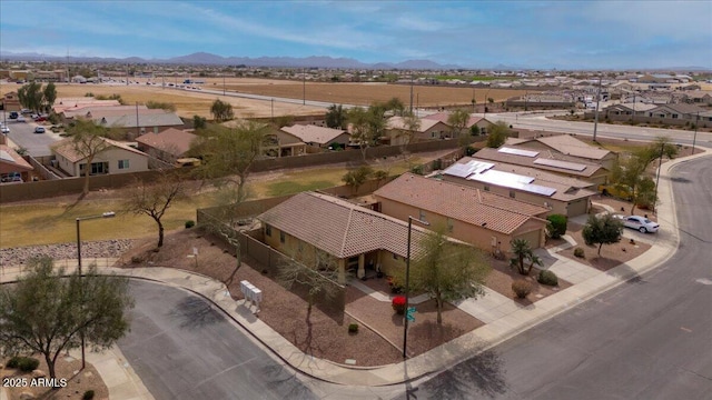 drone / aerial view with a mountain view and a residential view