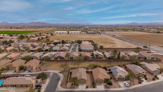 birds eye view of property featuring a residential view and a mountain view