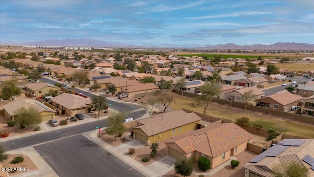 bird's eye view featuring a mountain view and a residential view