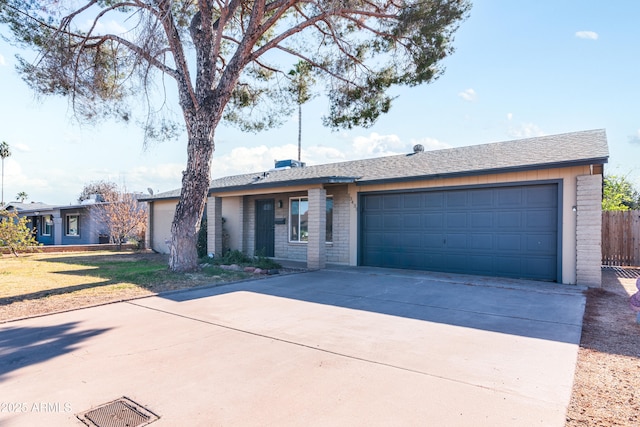 single story home featuring a garage