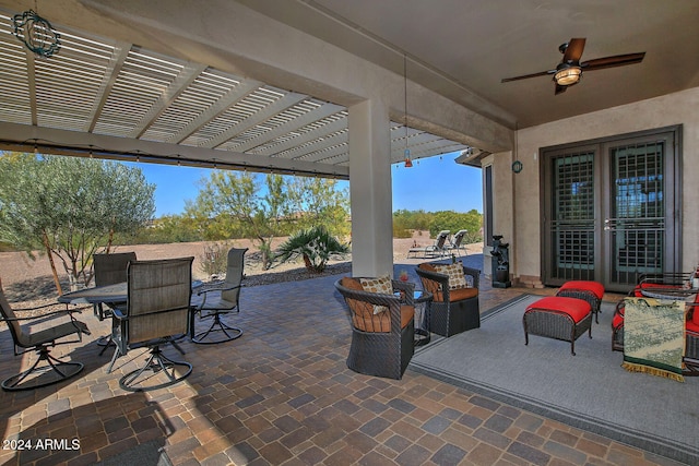 view of patio featuring ceiling fan