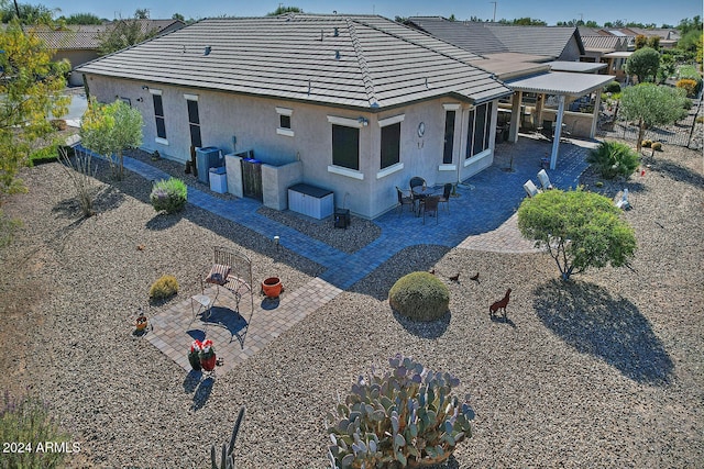 rear view of property with a patio area