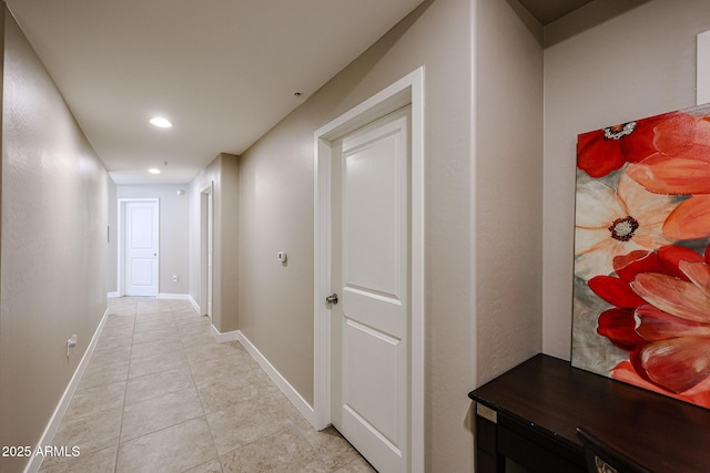 hallway featuring light tile patterned flooring