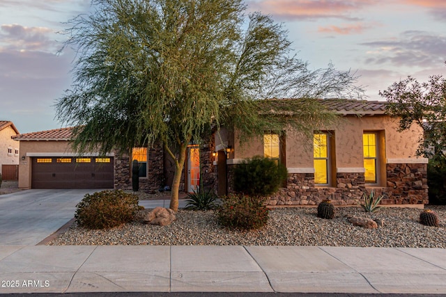 view of front of home with a garage