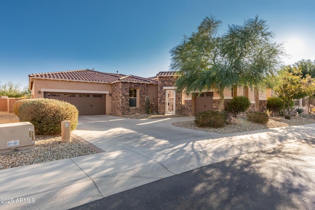 view of front of property with a garage