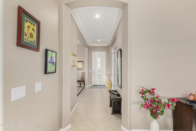 hallway featuring light tile patterned floors