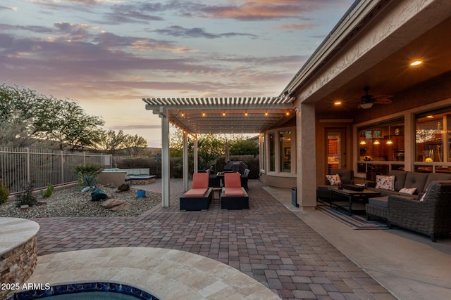 patio terrace at dusk with an outdoor hangout area, a pergola, area for grilling, and a jacuzzi