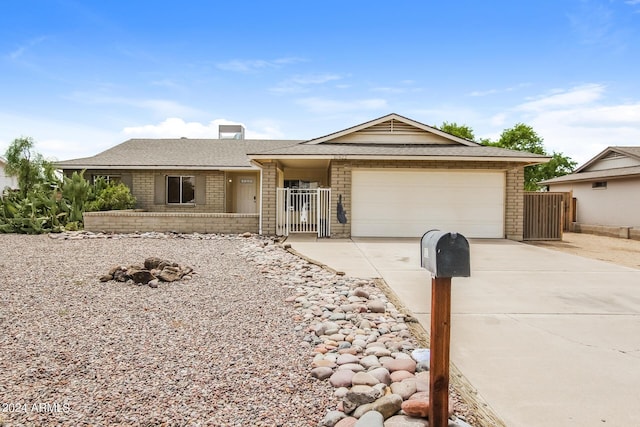 single story home featuring a garage