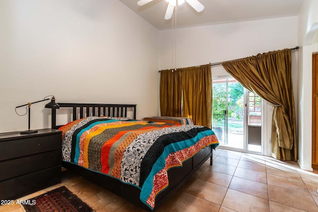 bedroom featuring lofted ceiling, access to exterior, ceiling fan, and light tile patterned flooring