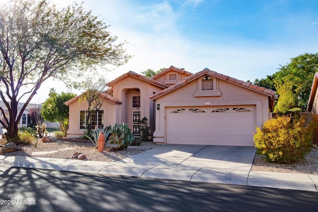 view of front of property featuring a garage