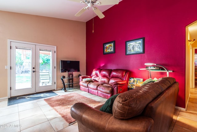 living room featuring french doors, ceiling fan, and light tile patterned flooring