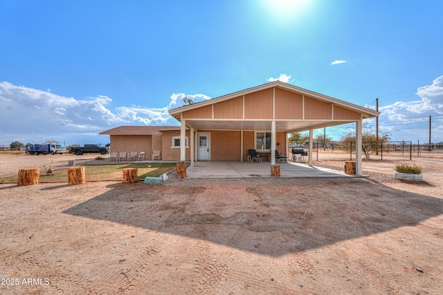 rear view of house with a patio area