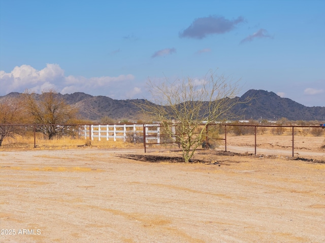 view of mountain feature with a rural view