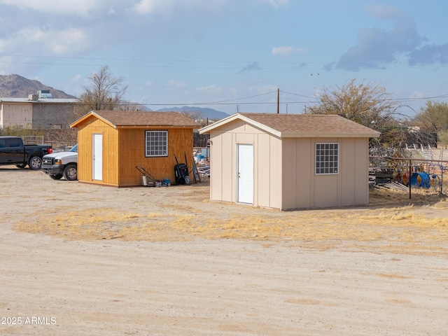 view of outdoor structure featuring a mountain view