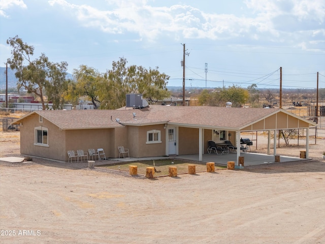 view of front of home featuring cooling unit