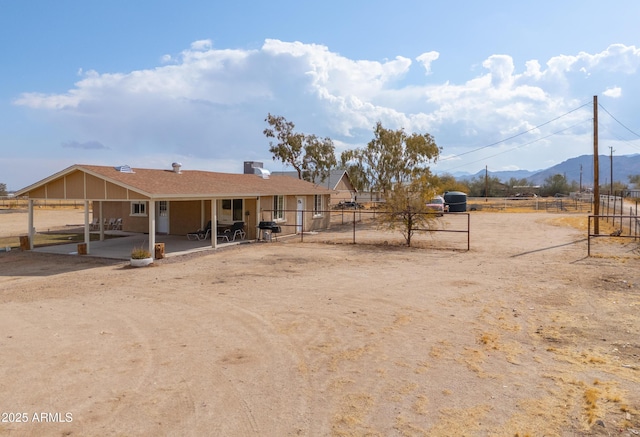 exterior space featuring a mountain view