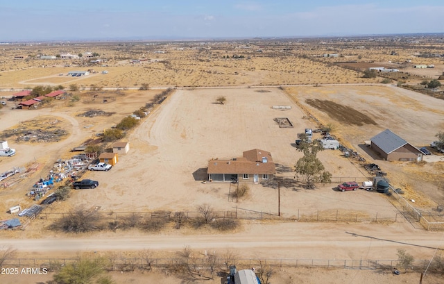 birds eye view of property featuring a rural view