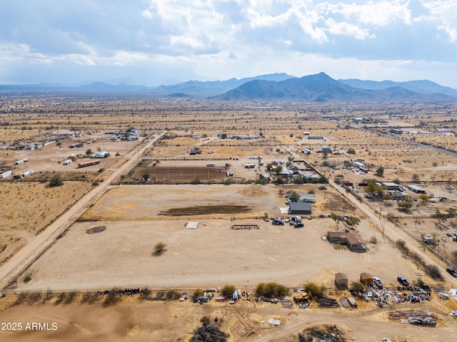 birds eye view of property featuring a mountain view