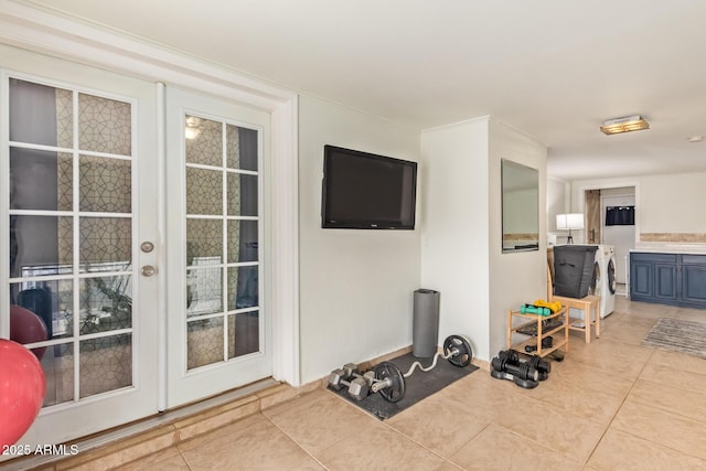 workout room featuring tile patterned floors