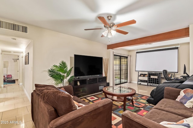 tiled living room with a ceiling fan and baseboards