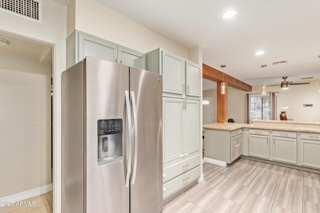 kitchen featuring stainless steel fridge, recessed lighting, baseboards, hanging light fixtures, and ceiling fan