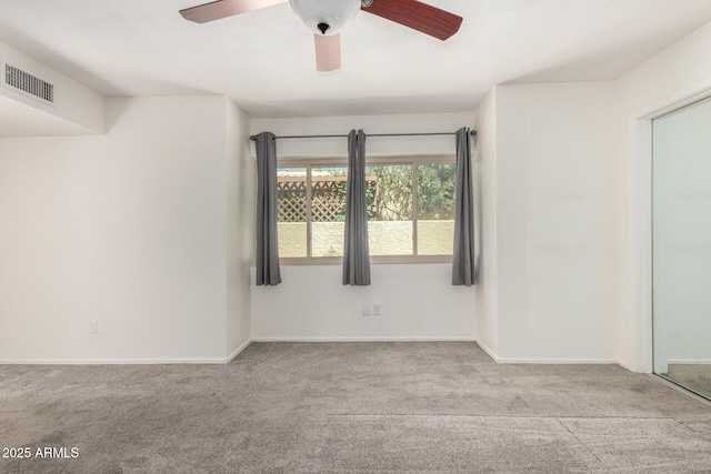 2059 E Brown Rd Unit 35, Mesa, AZ 85213 - carpeted spare room with ceiling fan and baseboards