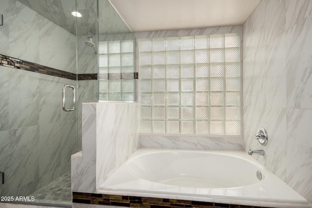 2059 E Brown Rd Unit 35, Mesa, AZ 85213 - bathroom with a marble finish shower, a bath, and tile walls