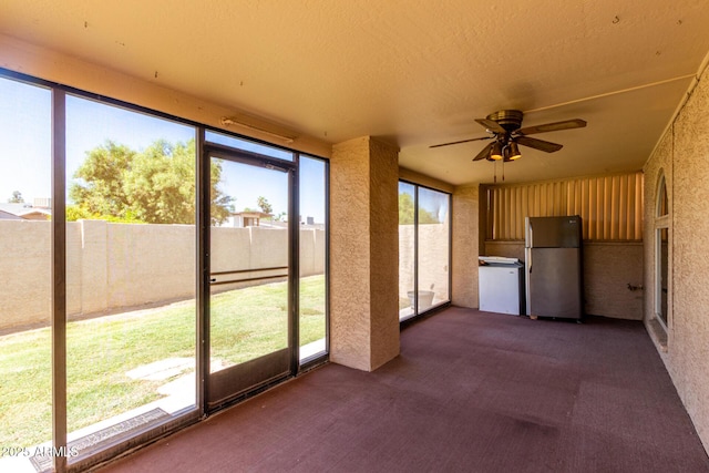 2059 E Brown Rd Unit 35, Mesa, AZ 85213 - unfurnished sunroom featuring ceiling fan and plenty of natural light