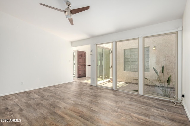 2059 E Brown Rd Unit 35, Mesa, AZ 85213 - unfurnished room featuring wood finished floors and ceiling fan