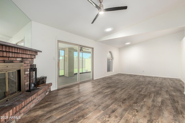 2059 E Brown Rd Unit 35, Mesa, AZ 85213 - unfurnished living room with lofted ceiling, a ceiling fan, wood finished floors, a fireplace, and recessed lighting