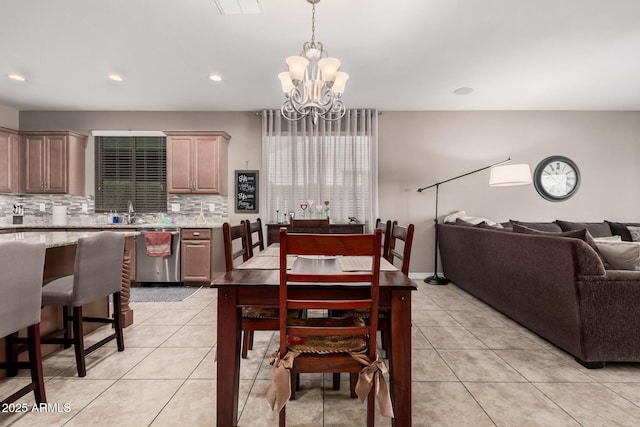 dining area featuring a chandelier, recessed lighting, and light tile patterned floors