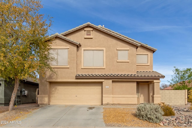 view of front of property featuring a garage