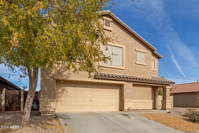 view of front of property featuring a garage