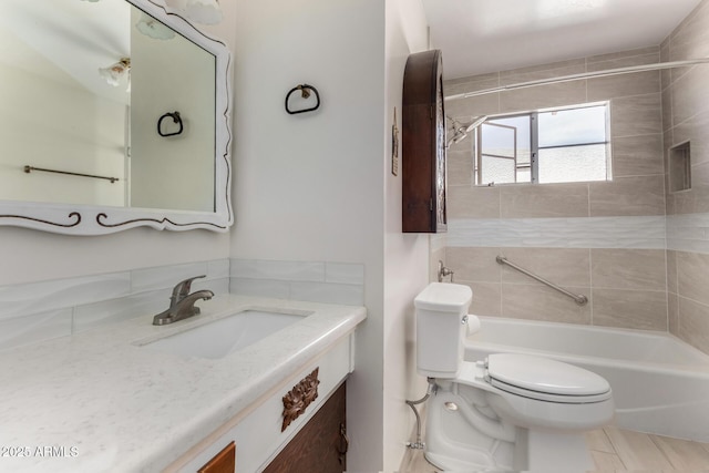 full bathroom featuring toilet, shower / tub combination, and vanity