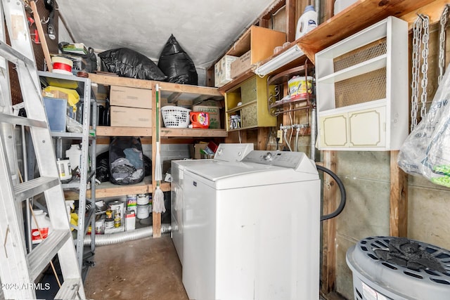 clothes washing area featuring washer / dryer