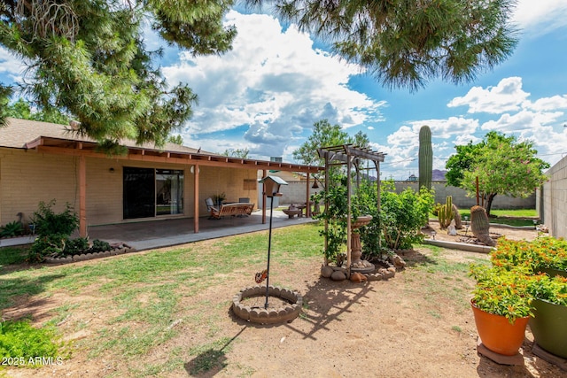 view of yard with a patio area and fence