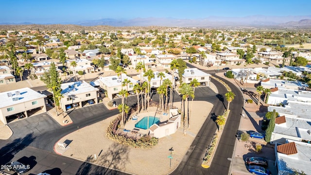 birds eye view of property with a mountain view