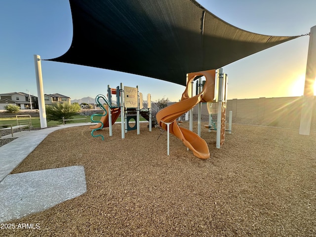 view of playground at dusk