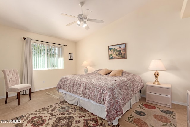 bedroom featuring vaulted ceiling, light tile patterned floors, and ceiling fan