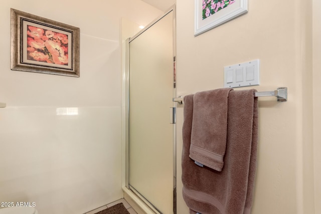 bathroom featuring an enclosed shower