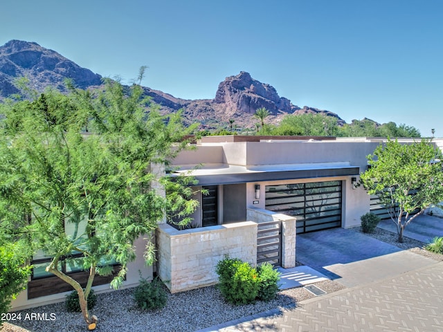 view of front of home with a mountain view