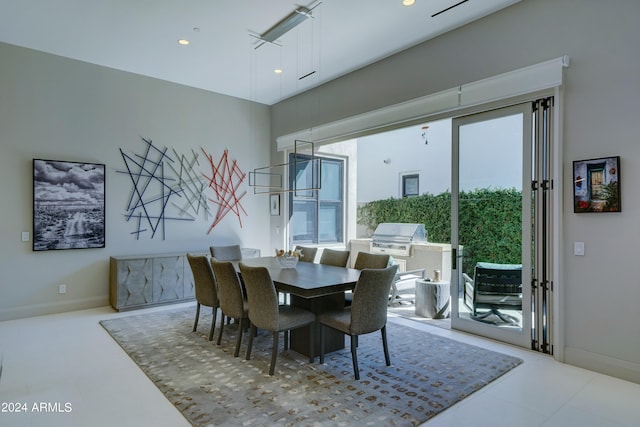 dining area featuring light tile patterned floors