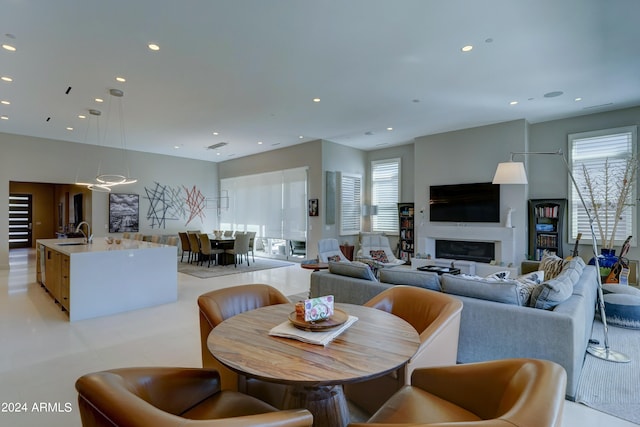 dining area with plenty of natural light and sink