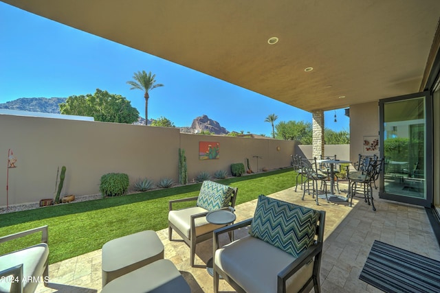 view of patio with a mountain view