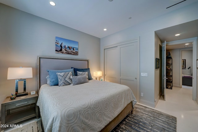 bedroom with carpet floors and a closet