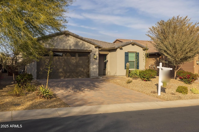 single story home with a garage