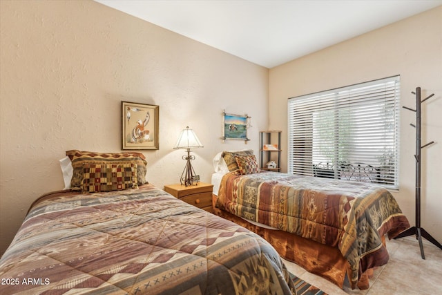 bedroom with a textured wall